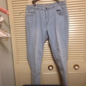 Woman within light wash straight leg jeans